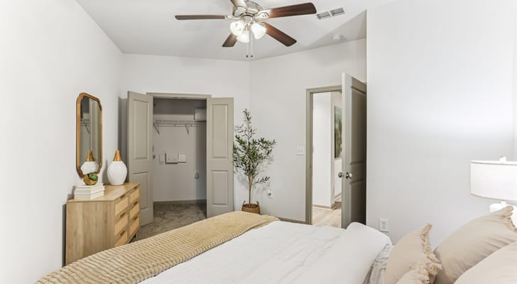 Cozy resident room with a bed and dresser