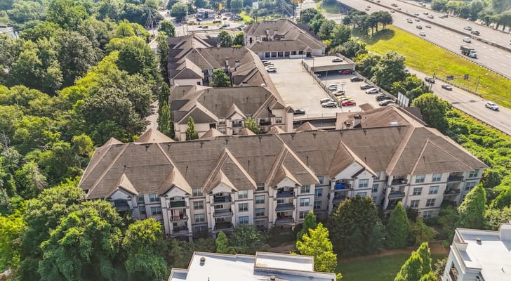 Aerial view of the Avana Uptown facility surrounded by greenery