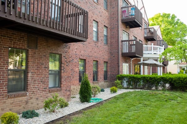 Outer view of the residential building with green space
