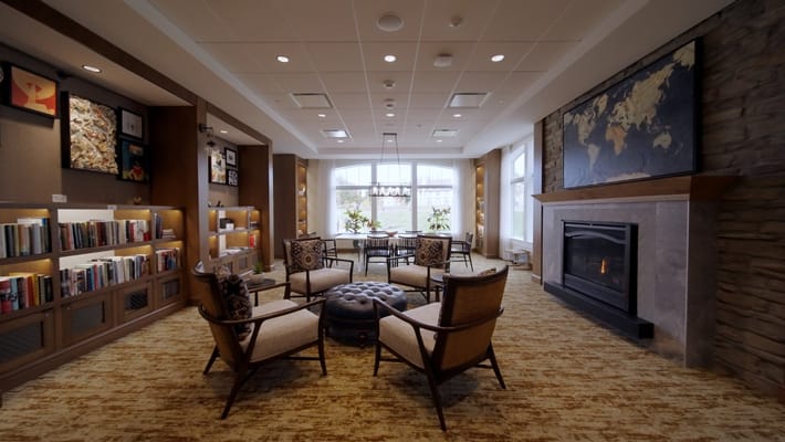 Interior common area with seating and fireplace
