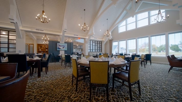 Bright dining room with elegant decor and seating