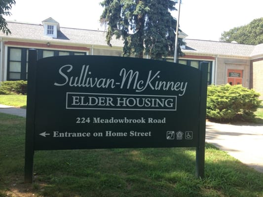 Sign for Sullivan-McKinney Elder Housing located at 224 Meadowbrook Road.