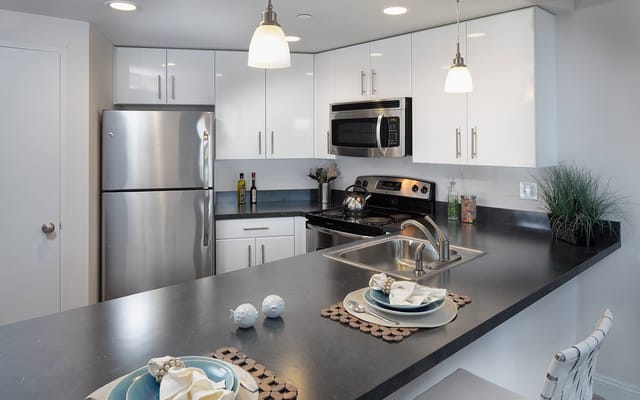 Bright and modern kitchen with stainless steel appliances