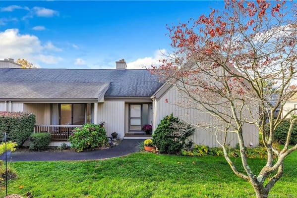 Exterior view of a single-story residence at Oronoque Village