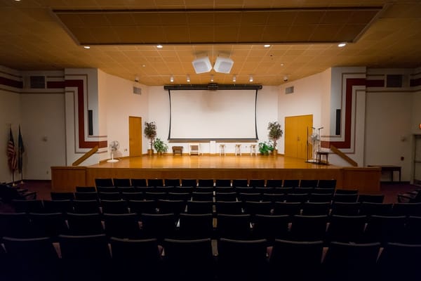 Empty auditorium with stage and seating