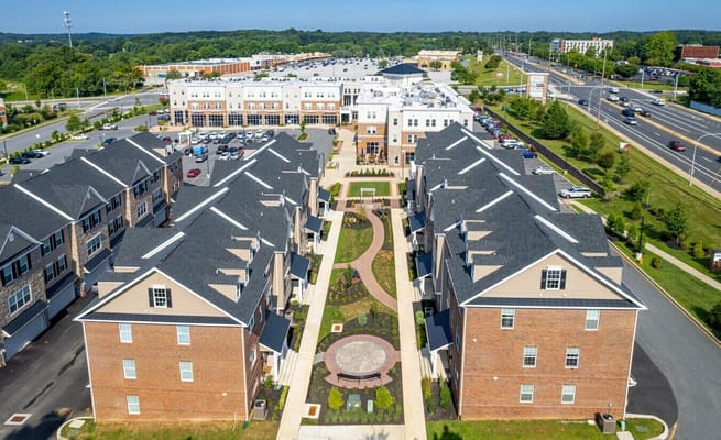Aerial view of Linden Hill Station Apartments showcasing pathways and gardens.