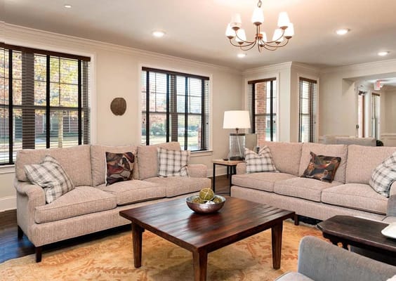 Comfortable living room with sofas and a wooden coffee table