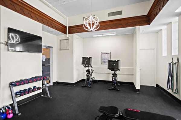 A view inside the fitness center with exercise equipment.