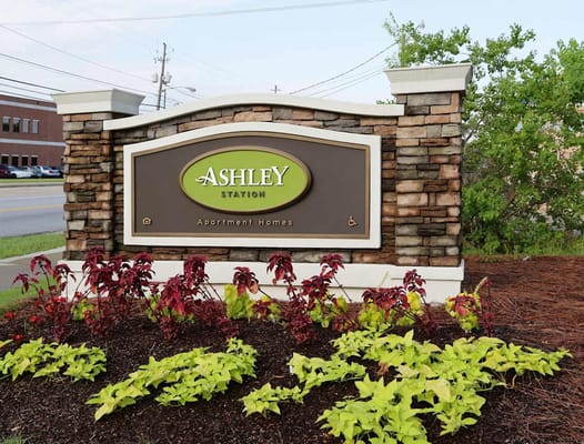 Signage for Ashley Station Apartment Homes with landscaping