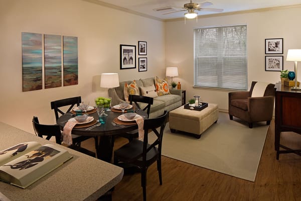 Cozy living room of a resident unit with dining area