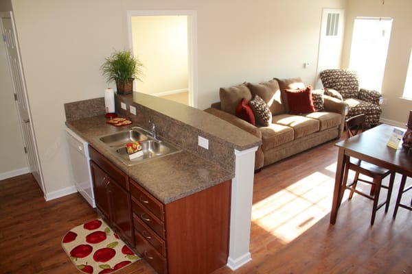 Cozy common area with a sofa and dining table