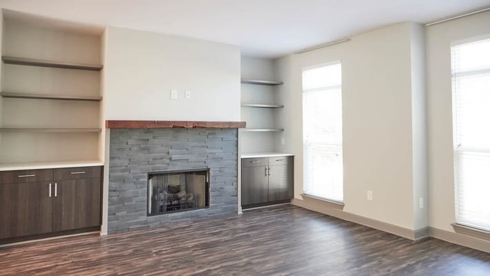 Bright and modern common area with a fireplace