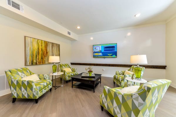 Cozy common area with seating and artwork