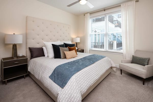 Cozy private bedroom with a large bed and natural light