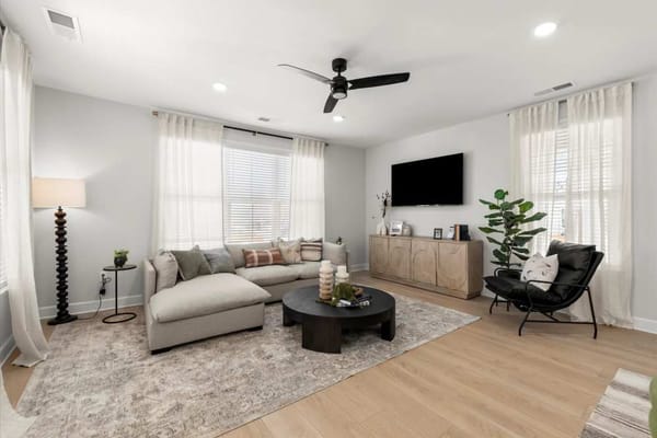 Bright common area with modern furniture and decor