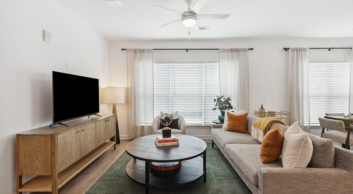 A bright, comfortable lounge area in a senior living facility