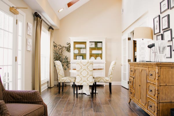 Bright and inviting interior common area with dining table