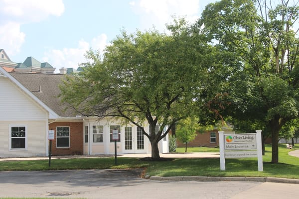Exterior view of the main entrance and sign