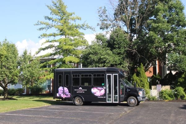 Facility transportation bus parked outside