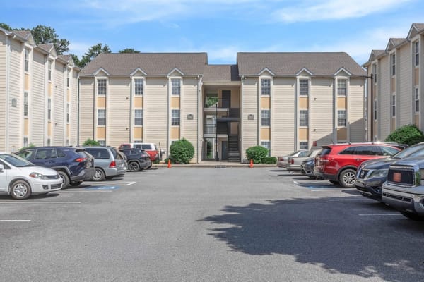 Exterior view of the facility with parking area
