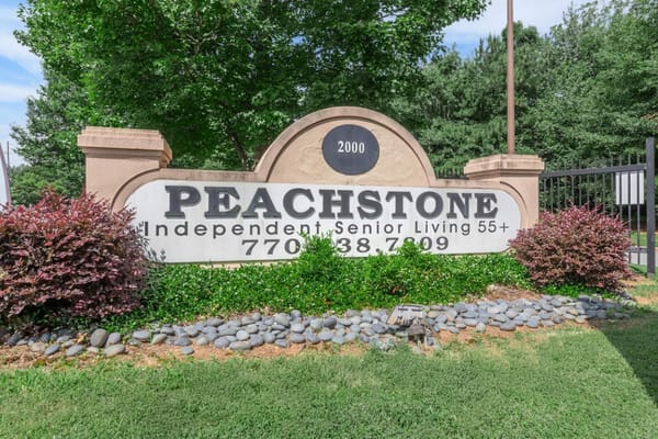 Facility sign displaying the name Peachstone Independent Senior Living
