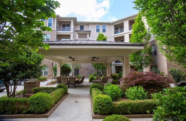 Outdoor seating area with landscaped gardens