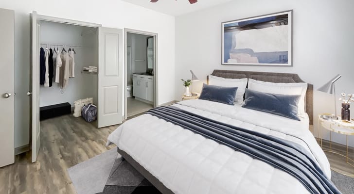 Bright and modern private resident room with a bed and closet