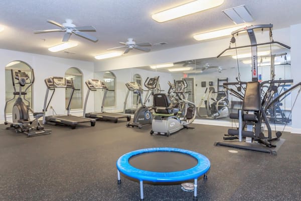 Well-equipped fitness center with various gym equipment