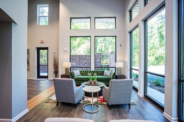 Interior common area with seating and large windows