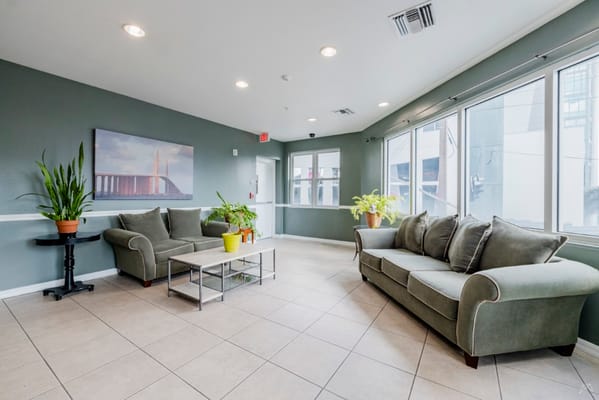 Interior common area with plants and seating