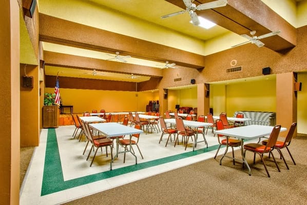 Interior view of a common area with tables and chairs
