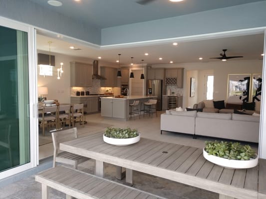 Open living area with kitchen and dining space