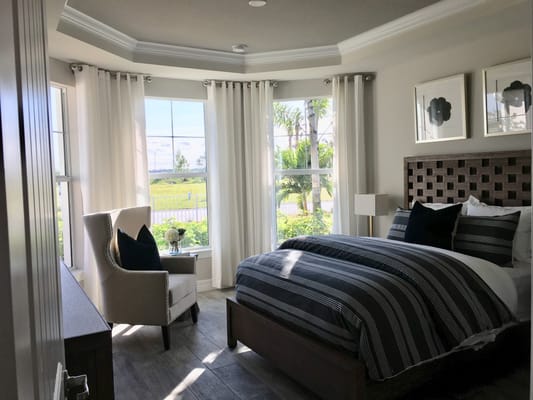 Bright, inviting resident room with windows and modern decor