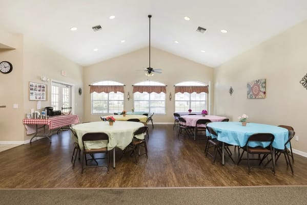 Interior of a common area with tables and decorations