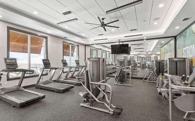 Interior view of a fitness room with gym equipment
