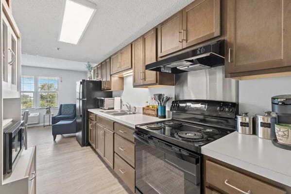 Interior kitchen of a resident apartment at Palm Harbor Apartments