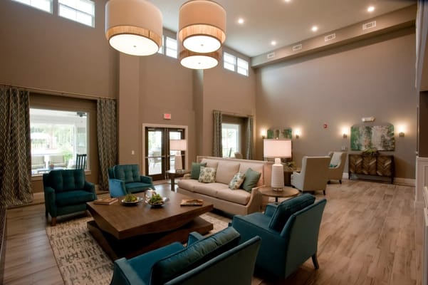 Bright common area with comfortable seating and decor