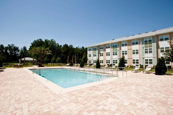 Outdoor pool area at Kenwood Place Apartments