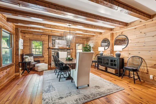 Cozy dining area with wooden beams and rustic decor