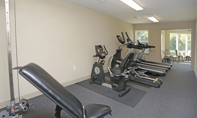 Interior view of a fitness room with exercise equipment