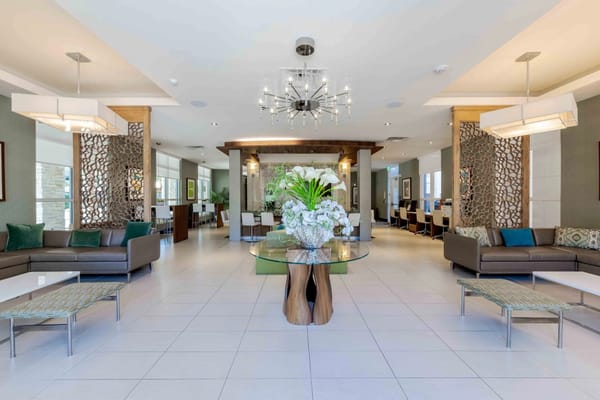 Bright and modern common area with seating and decor