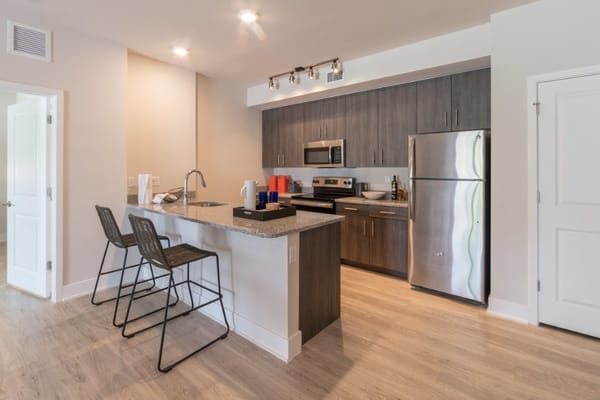 Modern kitchen area in a living unit with appliances