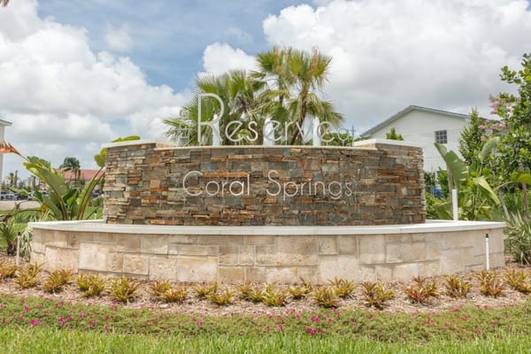 Exterior signage for the Reserve at Coral Springs community