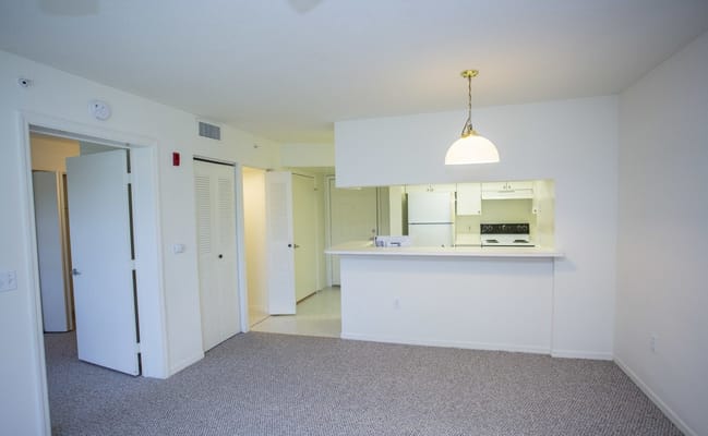 Interior view of a resident's room with kitchen area