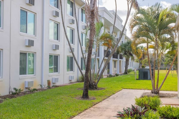 Garden and exterior view of a senior living facility