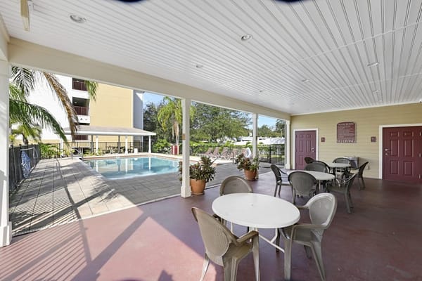 Outdoor seating area by the pool