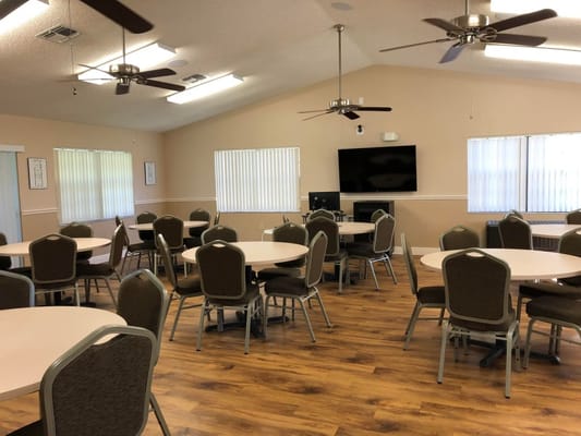 Interior common area with tables and chairs