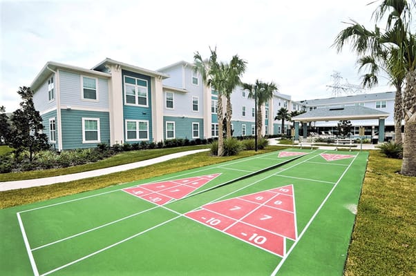 Outdoor shuffleboard court at Madison Reserve Apartments