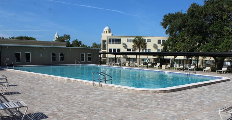 Outdoor pool area of the facility with seating