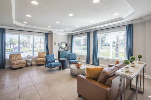 Bright common area with seating and natural light